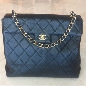Chanel Maxi Classic single flap black leather bag